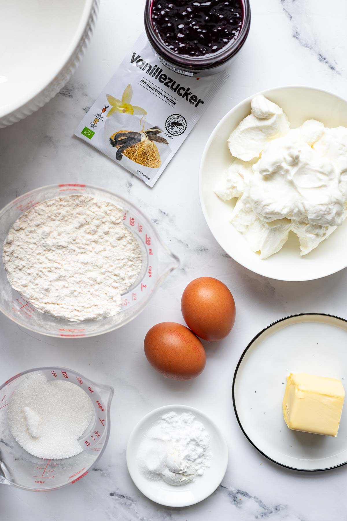 Zutaten für einfacher Joghuer-Kuchen Rezept